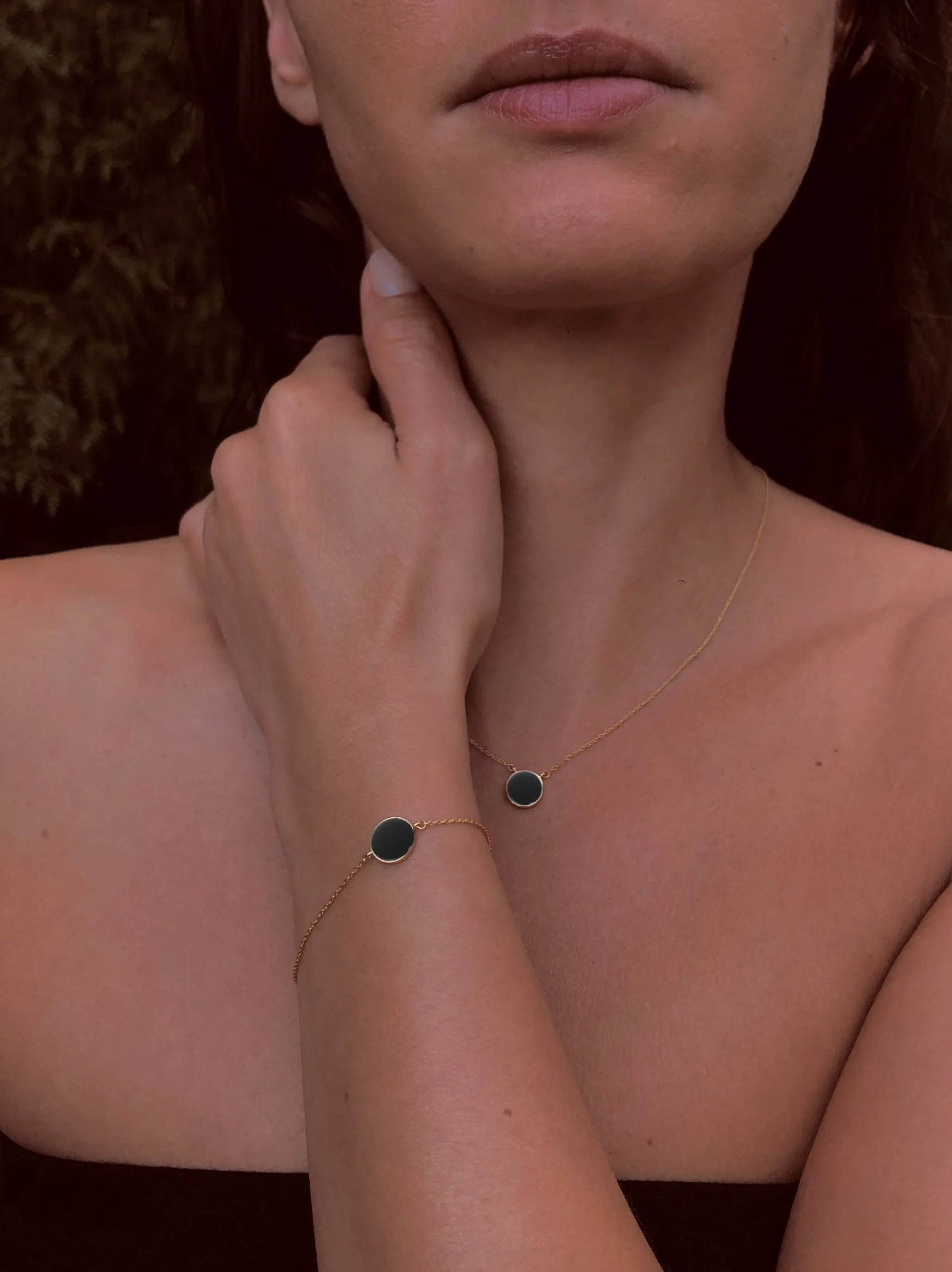Bracelet in 925 Silver gilded with 18k yellow gold assembled with black Onyx