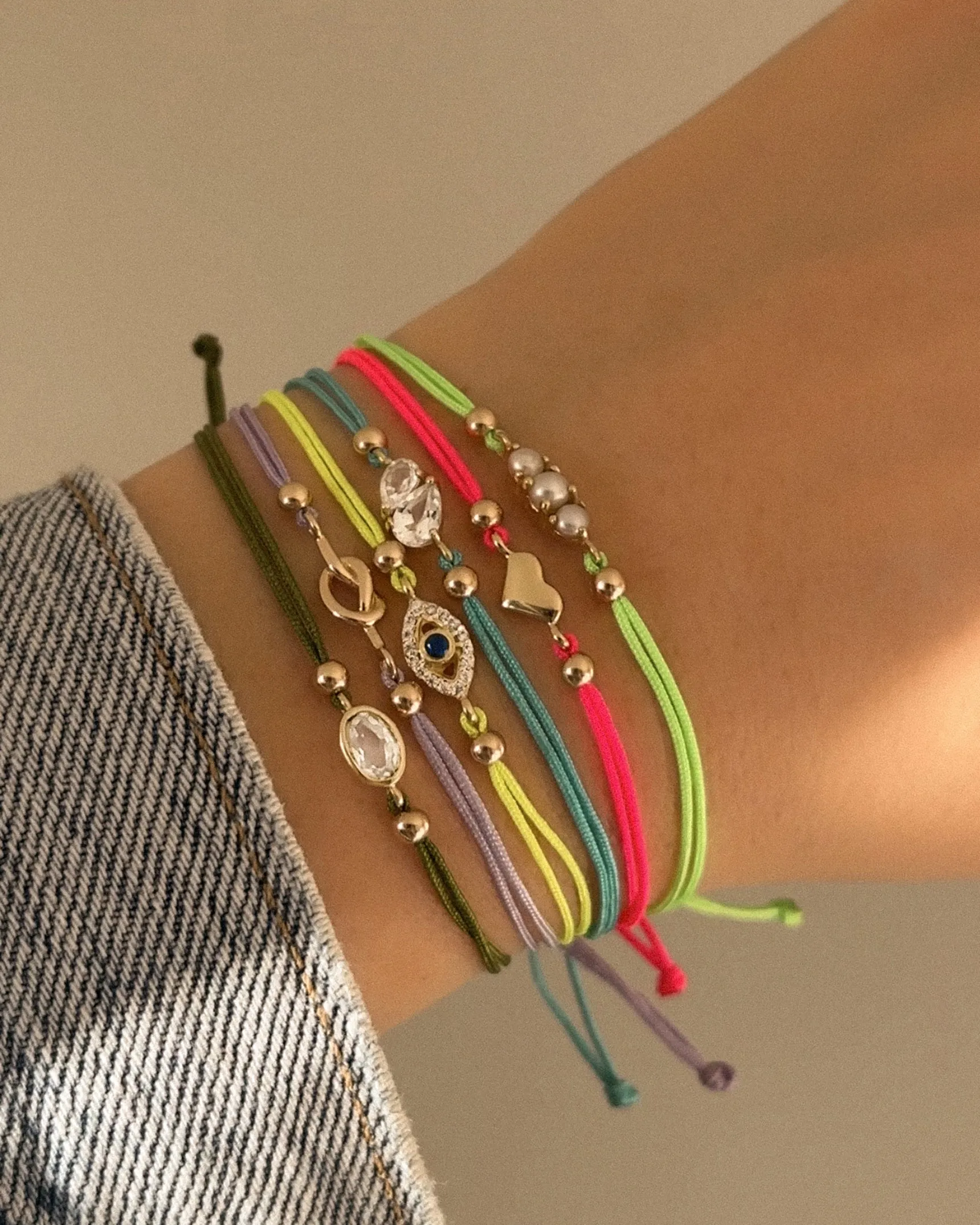 Colored Cord Love Me Knot Bracelet