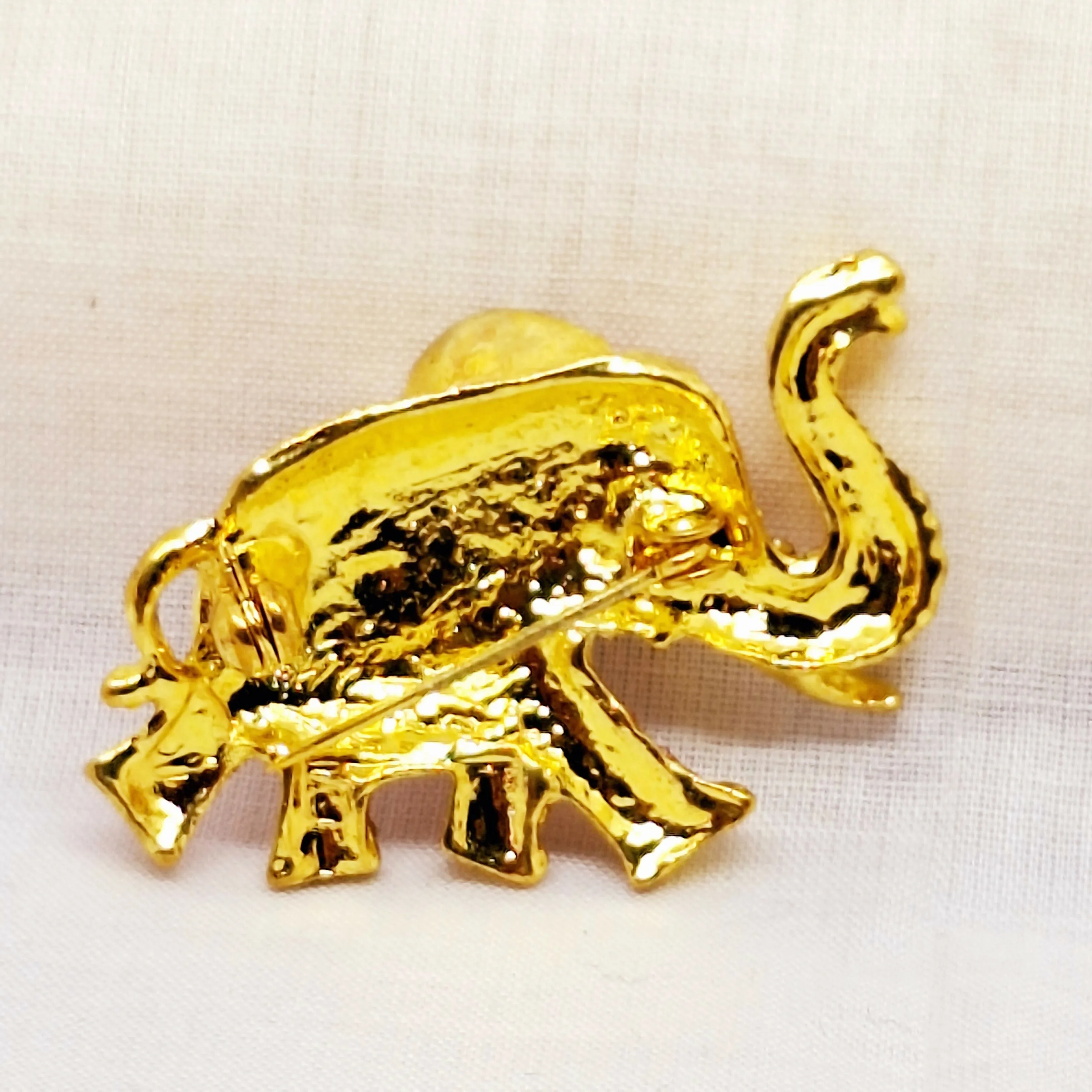 Gold Tone & Faux Pink Topaz Elephant Brooch