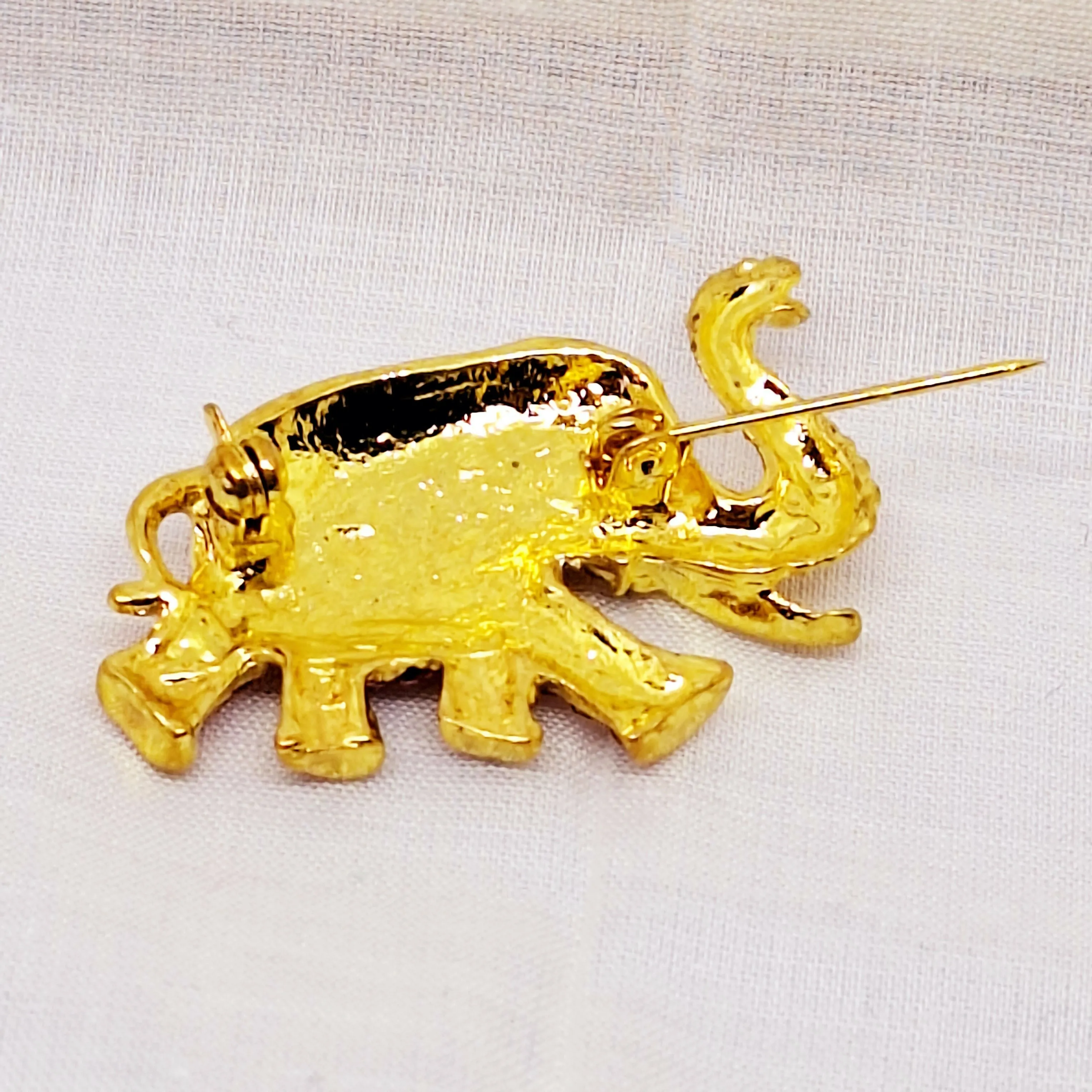 Gold Tone & Faux Pink Topaz Elephant Brooch