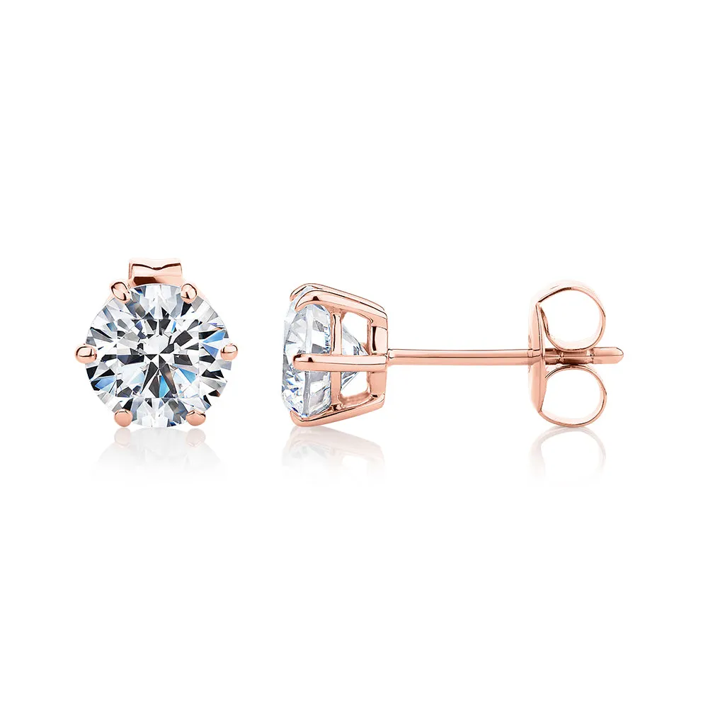 Round Brilliant stud earrings with 2 carats* of diamond simulants in 10 carat rose gold